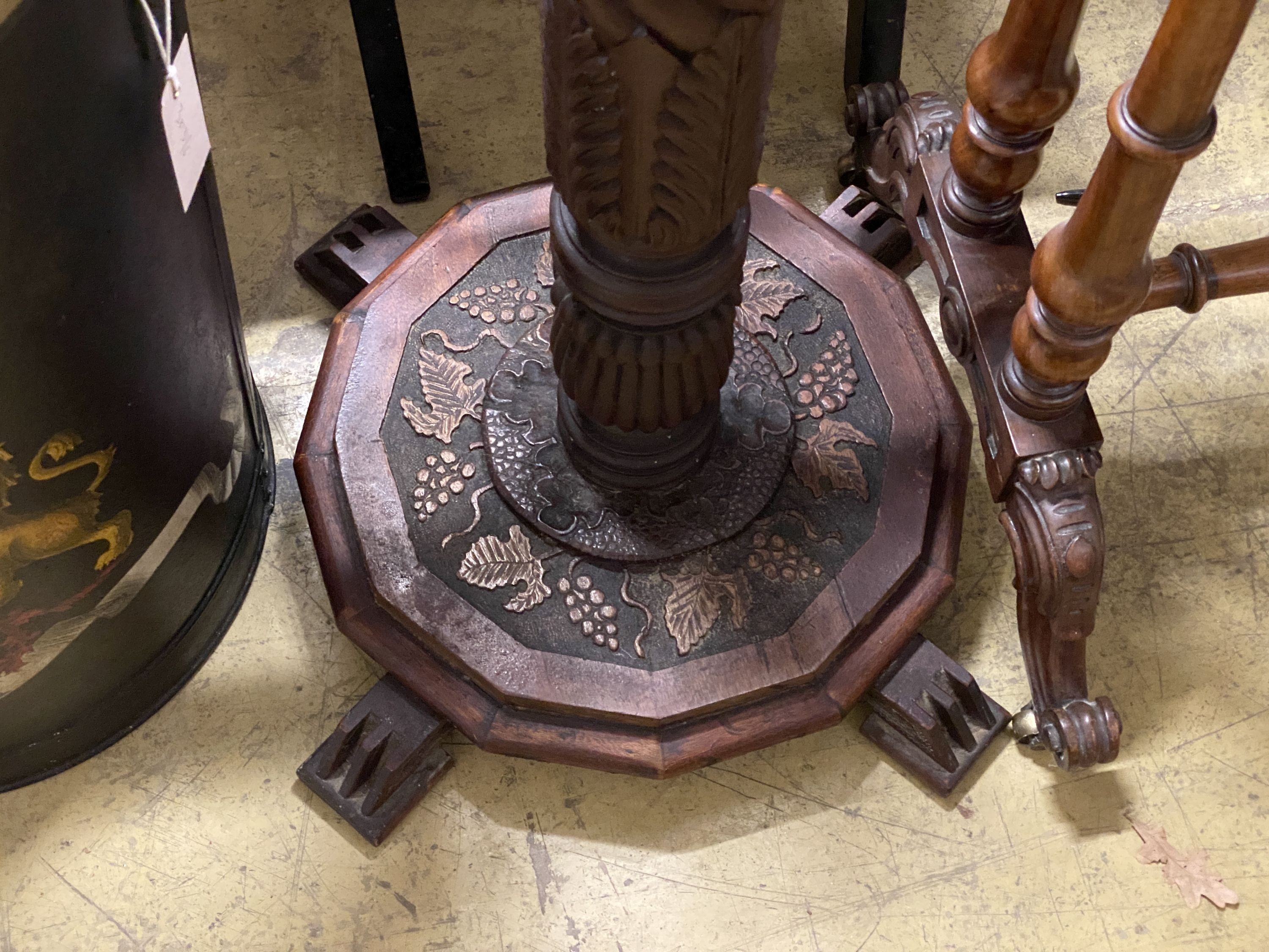 A carved mahogany pedestal, width 36cm, height 127cm